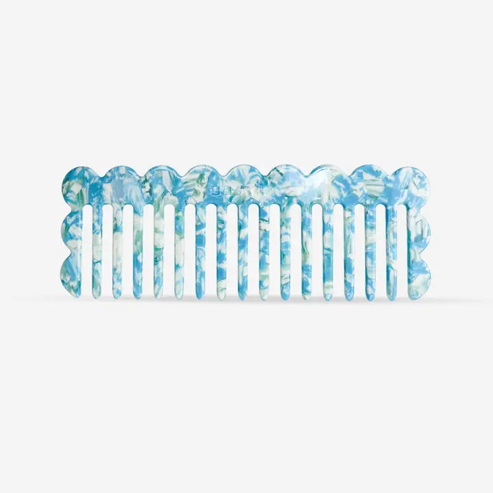 Peigne à cheveux en plastique bleu