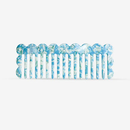 Peigne à cheveux en plastique bleu