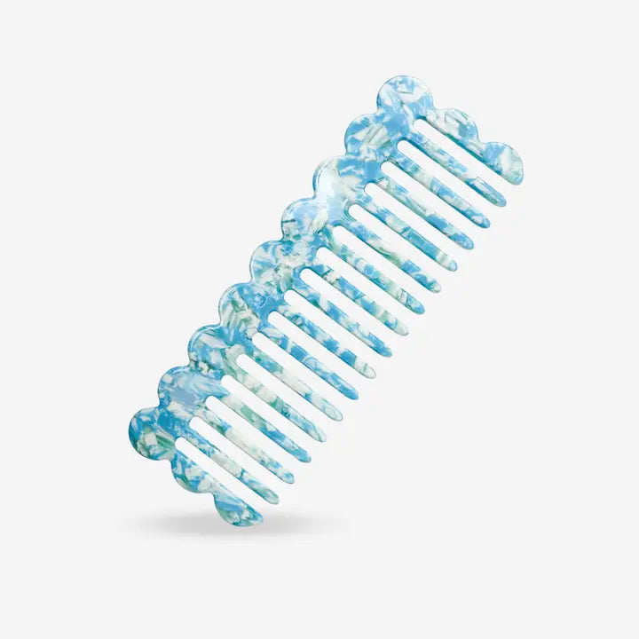 Peigne à cheveux en plastique bleu